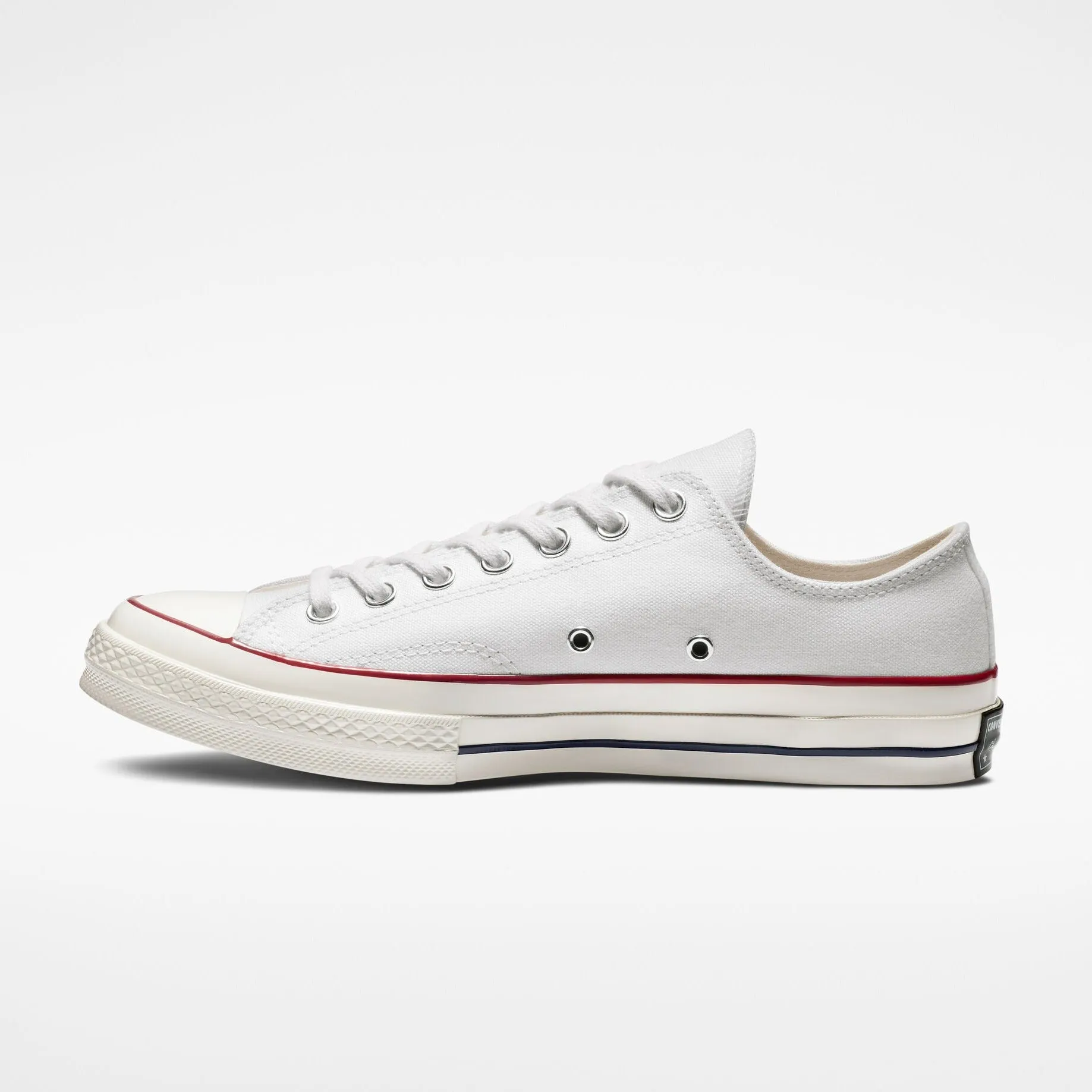 Sure! Here’s an optimized title for the Converse Chuck 70 Vintage Canvas Low Top in White: 

Converse Chuck 70 Vintage Canvas Low Top Sneakers - Classic White Unisex Shoes